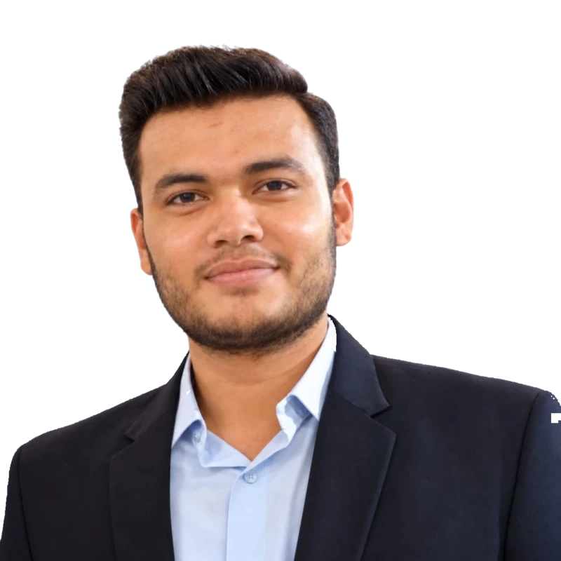 Asad Ansari wearing a dark suit and light blue shirt